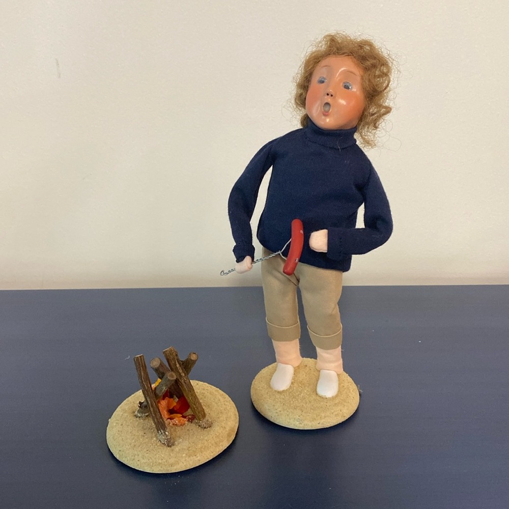Buyers Choice Caroler; beach boy with hot dog & fire